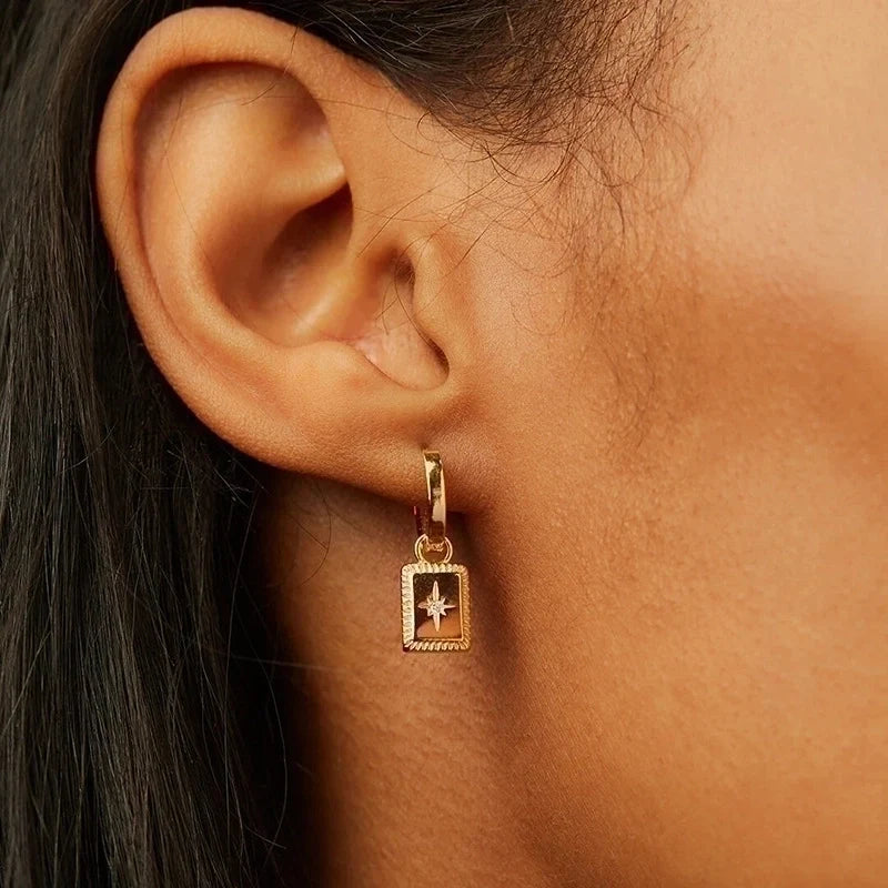 Molly Zircon star drop earrings
