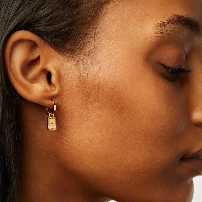 Molly Zircon star drop earrings